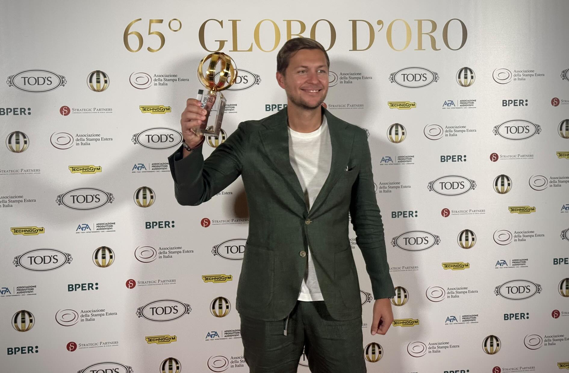 Matthias Salzburger with trophy at 65th Globo d'oro awards